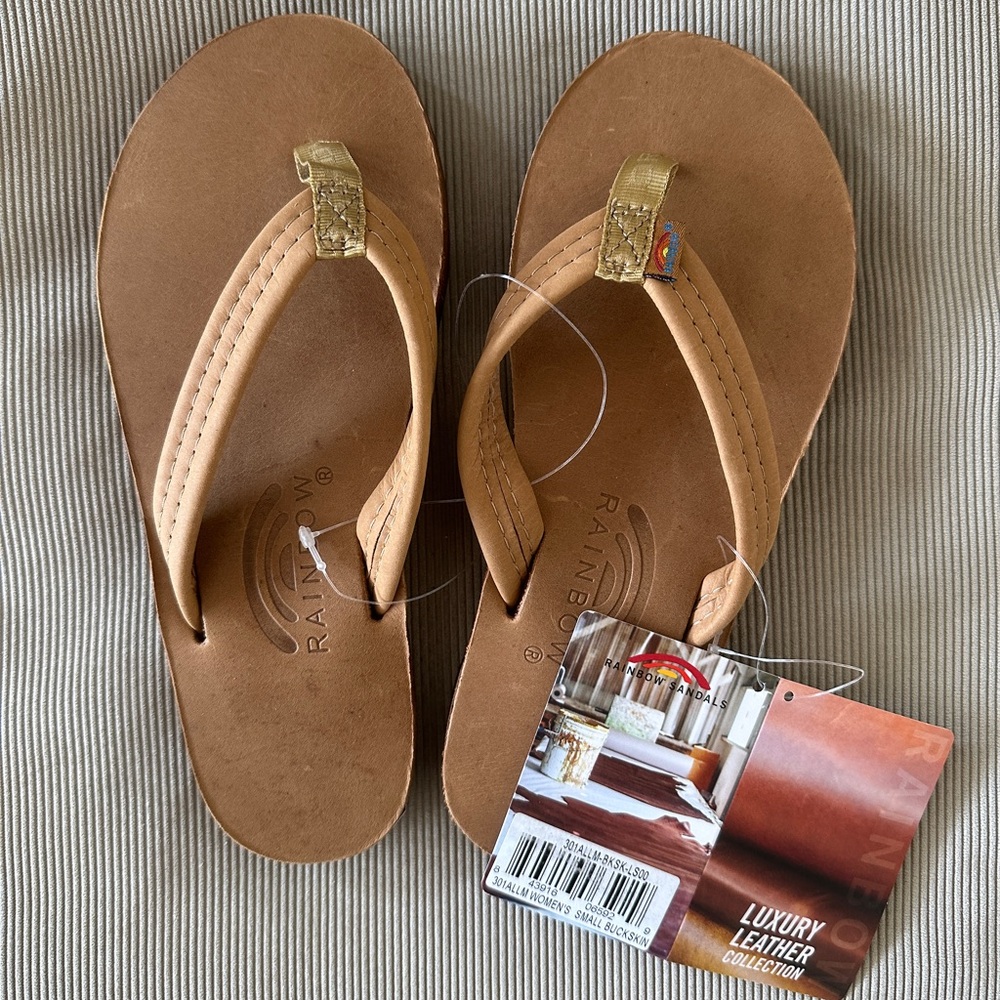 BRAND NEW never worn Rainbow Sandals Flip Flops. Ladies Size Small 5.5-6.5